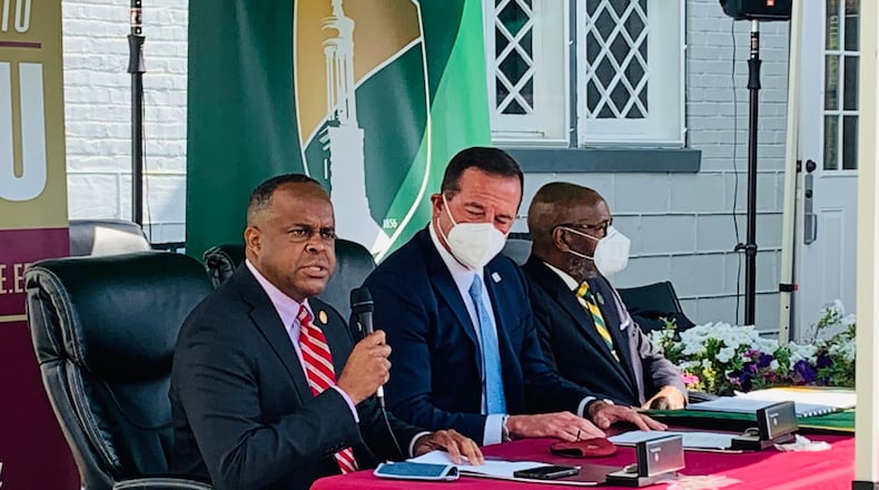 Central State University President Dr. Jack Thomas, Director of Opportunities for Ohioans with Disabilities Kevin Miller, and Wilberforce University President Dr. Elfred Anthony Pinkard sign a partnership agreement Tuesday.