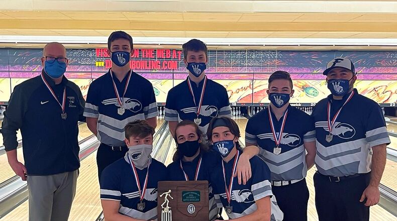The Fairmont High School boys bowling team with its district runner-up trophy. Back row, from left: Coach Jeremy Fleck, Isaiah Shannon, Tyler Stegemoller, Colton Mahaffey and assistant coach Matt Mahaffey. Front row, from left: Dayton Foster, Tyler Milton and Dylan Potts. CONTRIBUTED