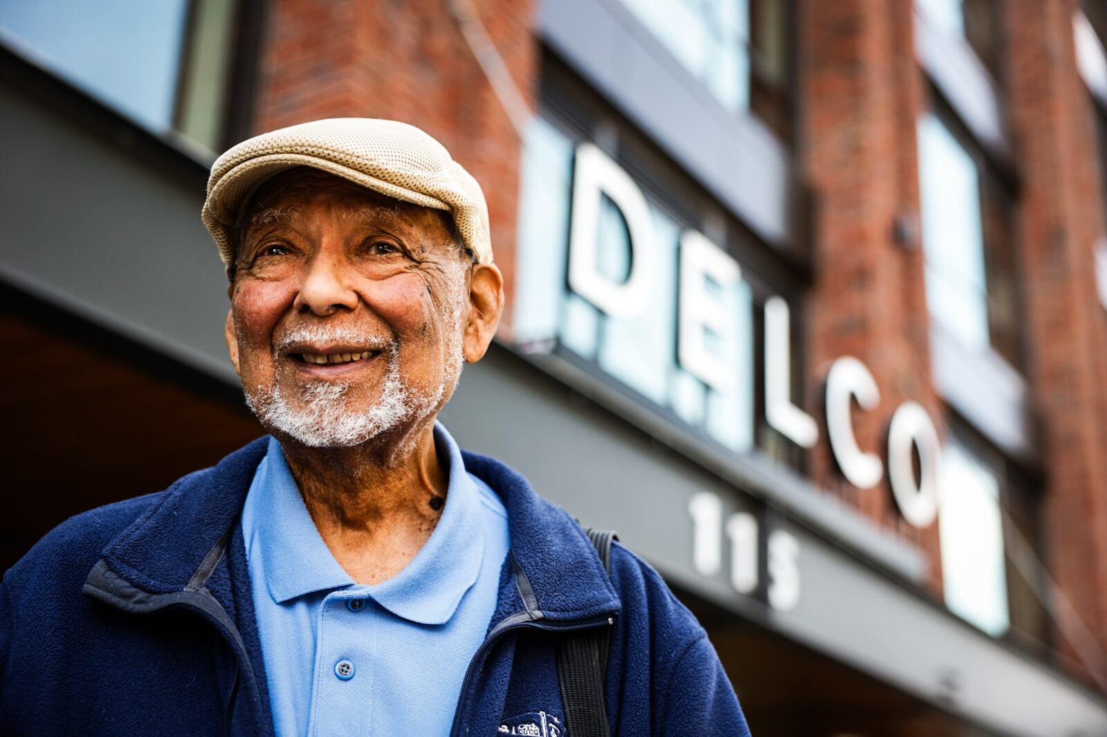 Chuck Johnson, 89, worked with Charles Kettering for 6 years before Kettering retired. Johnson is stand in front of the old Mendelson Building that has been converted into a commercial and residential development called the Delco Building. JIM NOELKER/STAFF