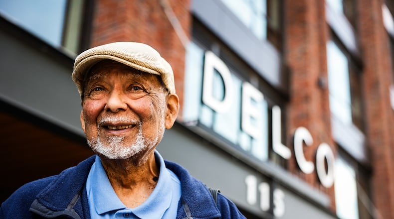 Chuck Johnson, 89, worked with Charles Kettering for 6 years before Kettering died. Johnson is seen here in front of the old Mendelson building that has been converted into a commercial and residential development called the Delco. JIM NOELKER/STAFF