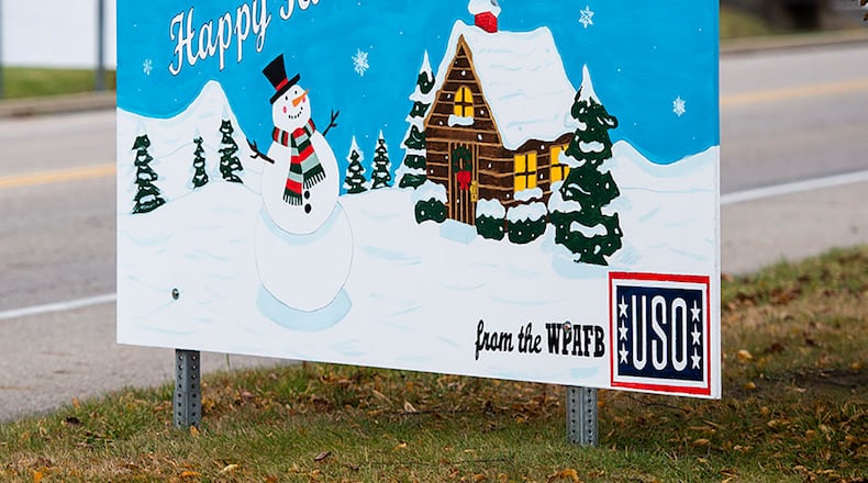 Giant Christmas cards designed by base organizations line Skeel Avenue on Wright-Patterson Air Force Base. The cards are an attempt to keep people socially connected during COVID-19 restrictions. U.S. AIR FORCE PHOTOS/WESLEY FARNSWORTH