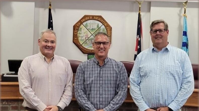 Huber Heights's management team includes city manager John Russell, center, and assistant city managers Alex Zaharieff, left and Aaron Sorrell, right. Contributed photo