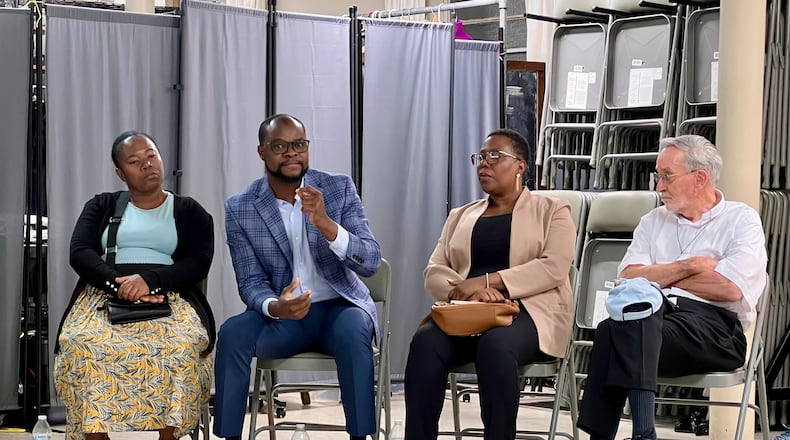 Springfield resident and Haitian immigrant Viles Dorsainvil speaks during a break-out discussion following a Service of Lament for people detained and deported by ICE. The event was held Sunday at the East Dayton Fellowship church. AIMEE HANCOCK/STAFF