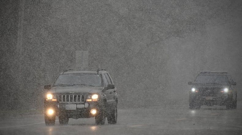 One of the first snowfalls of the season, makes visibility hard on 35 near New Lebanon Monday, December 18, 2023. MARSHALL GORBY \STAFF