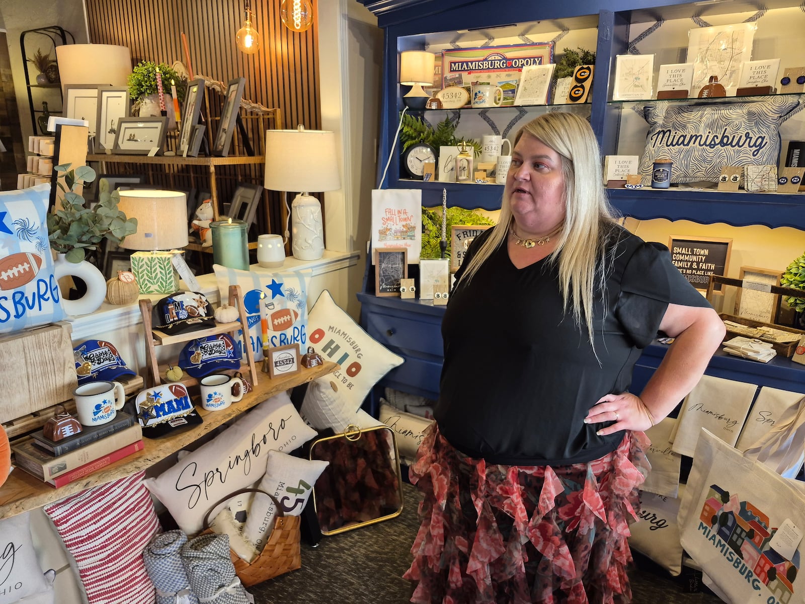Summer Hall said sales have been up over the last 90 days at her Miamisburg store, With Much Grace, a trend she expects to continue through Christmas. MICHAEL KURTZ / STAFF