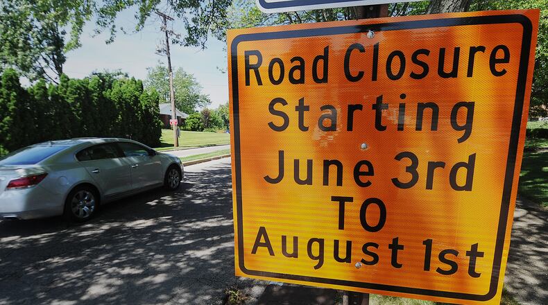 East David Road's westbound lanes from Ackerman Boulevard to Far Hills Avenue in Kettering have been closed since early June. They are expected to reopen this week, a city official said. MARSHALL GORBY\STAFF