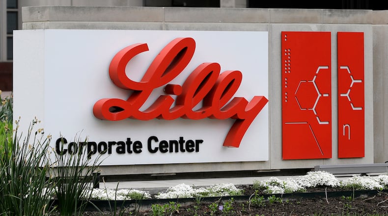 FILE - A sign for Eli Lilly & Co. stands outside their corporate headquarters in Indianapolis on April 26, 2017. (AP Photo/Darron Cummings, File)