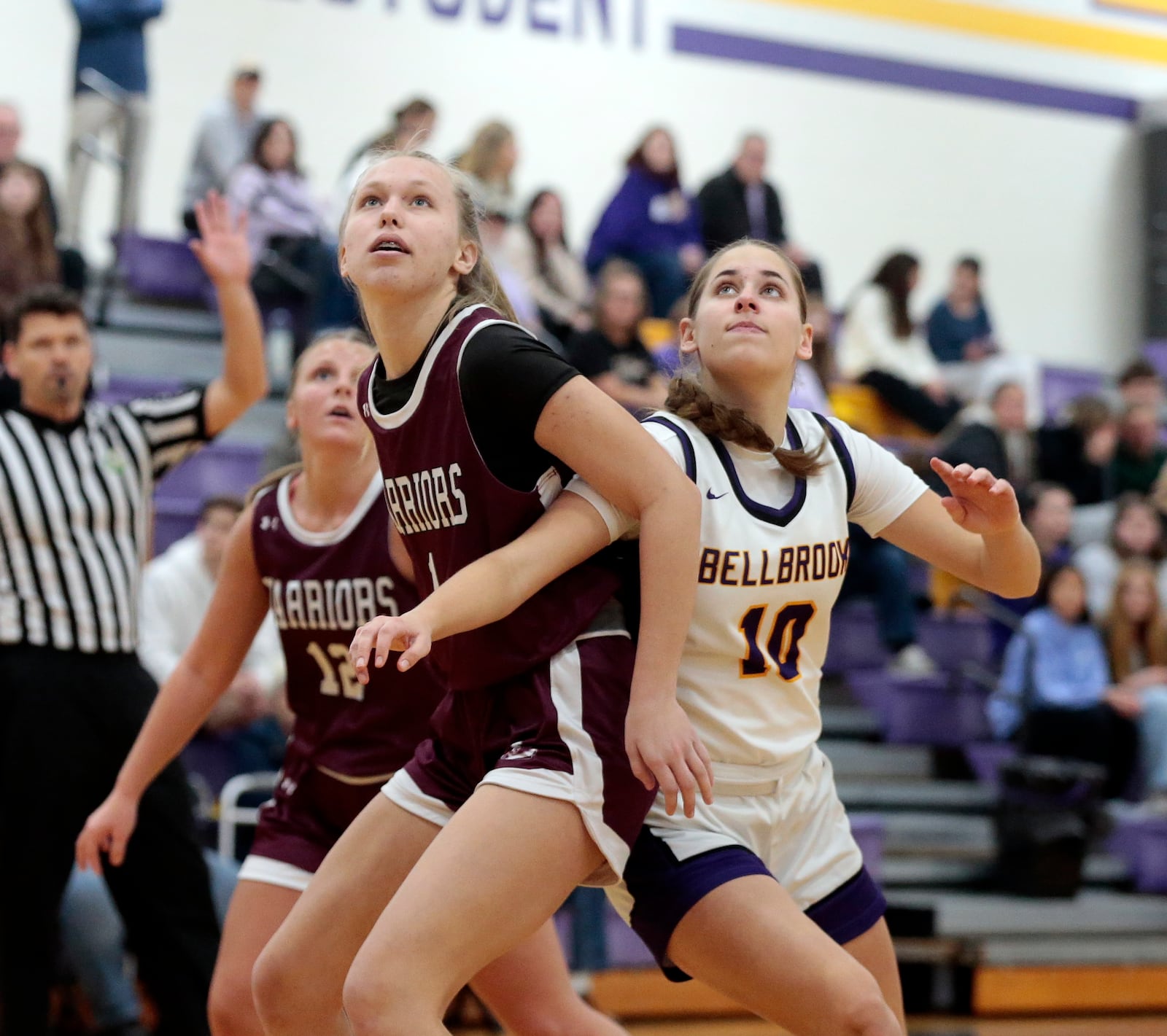 Lebanon sophomore Beth Trakin and Bellbrook senior Ainsley Gregory battle for position on a rebound attempt. Bellbrook defeated Lebanon 52-39 in a girls basketball game Monday, Dec. 29, 2025, in Bellbrook. STEVEN WRIGHT / STAFF