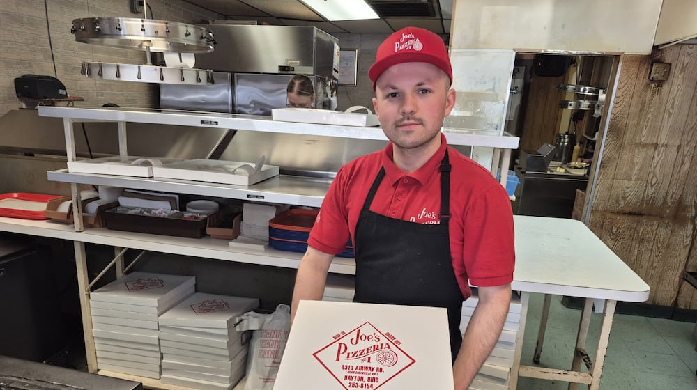 Caleb Grubb will be working his fourth Super Bowl at Joe's Pizzeria on Airway Road. He said the store will be slammed Sunday with people ordering 6 to 10 pizzas per order. MICHAEL KURTZ / STAFF