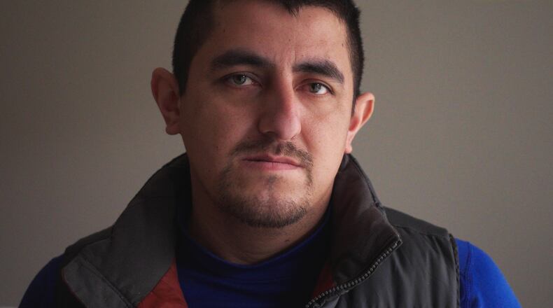 Alberto Castañeda Mondragón poses for a portrait at an apartment Wednesday, Feb. 4, 2026, in St. Paul, Minn. (AP Photo/Mark Vancleave)