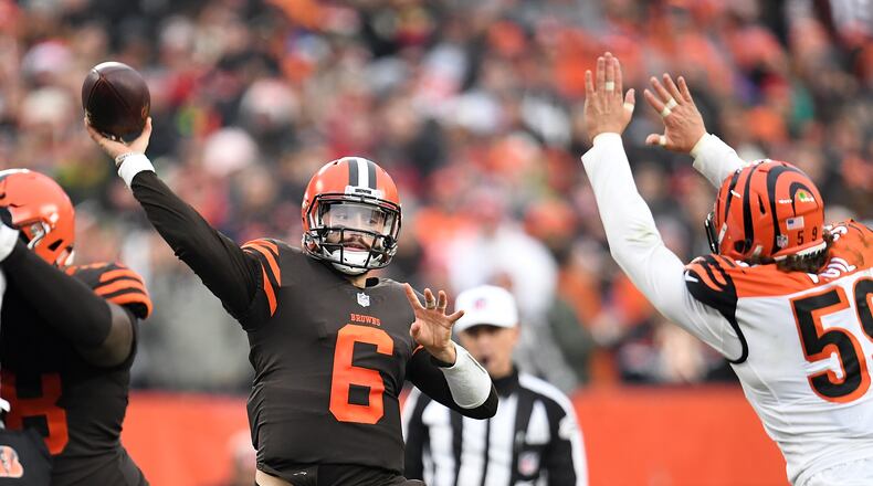 CLEVELAND, OH - DECEMBER 23: Baker Mayfield #6 of the Cleveland Browns shows a pass in front of Nick Vigil #59 of the Cincinnati Bengals during the second half at FirstEnergy Stadium on December 23, 2018 in Cleveland, Ohio. (Photo by Jason Miller/Getty Images)