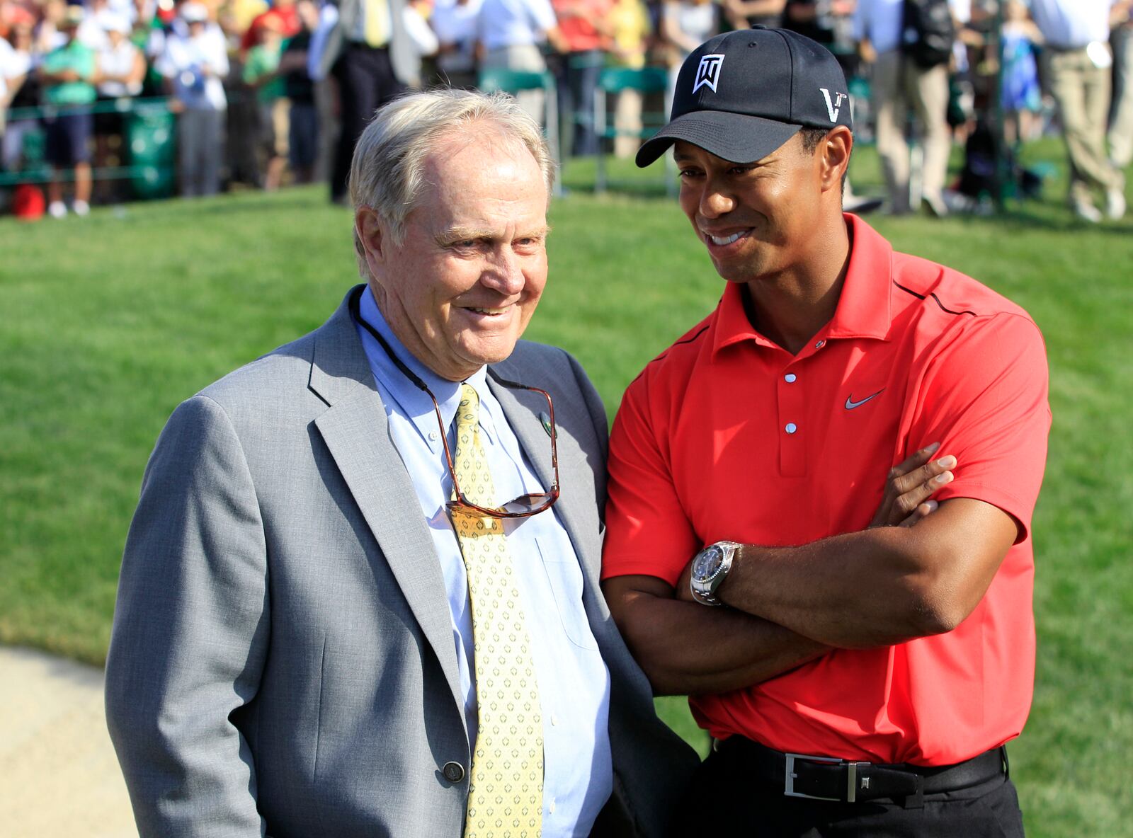 FILE - In this Sunday, June 3, 2012, file photo, Jack Nicklaus, left, talks with Tiger Woods after Woods won the Memorial golf tournament at the Muirfield Village Golf Club in Dublin, Ohio. (AP Photo/Tony Dejak, File)