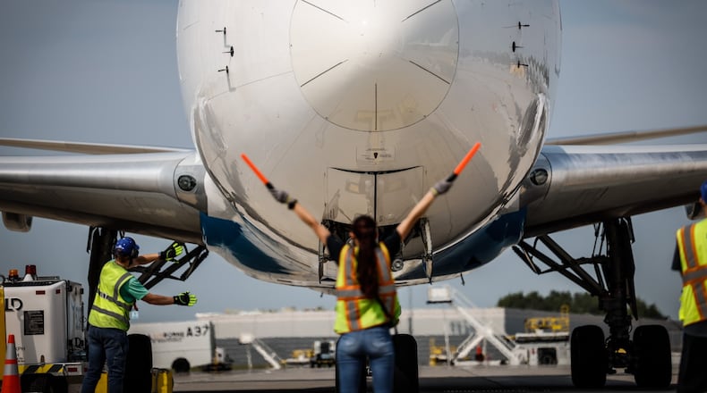 Amazon ground crews position a 767 cargo plan for offload at the Wilmington Air Park in July 2021. JIM NOELKER/STAFF