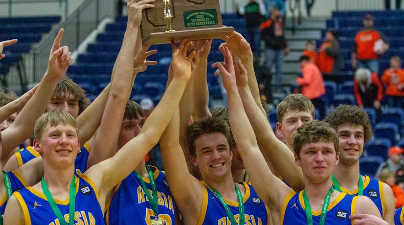 Russia celebrates it region final victory over Jackson Center on Friday. Many of the players who will play in the state tournament this Friday at UD Arena played on the Raiders' state championship baseball team last year. CONTRIBUTED/Jeff Gilbert