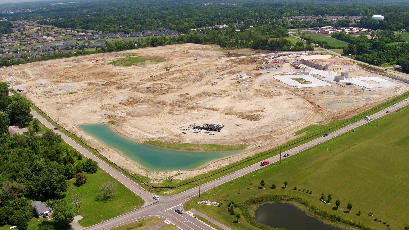A huge chunk of land in Centerville is being developed for senior housing on the south side of town.  About 70 acres of the former Rabold Farm are being shaped into roads, lots and buildings for the Randall Residence of Centerville and Woodland Greens homesites at a cost of $42 million.  The new buildings currently under construction will house nearly 500 residents including assisted living apartments and memory support apartments with a total of 171,021-square-feet of space.  The balance of the land will be divided into lots for houses.   TY GREENLEES / STAFF