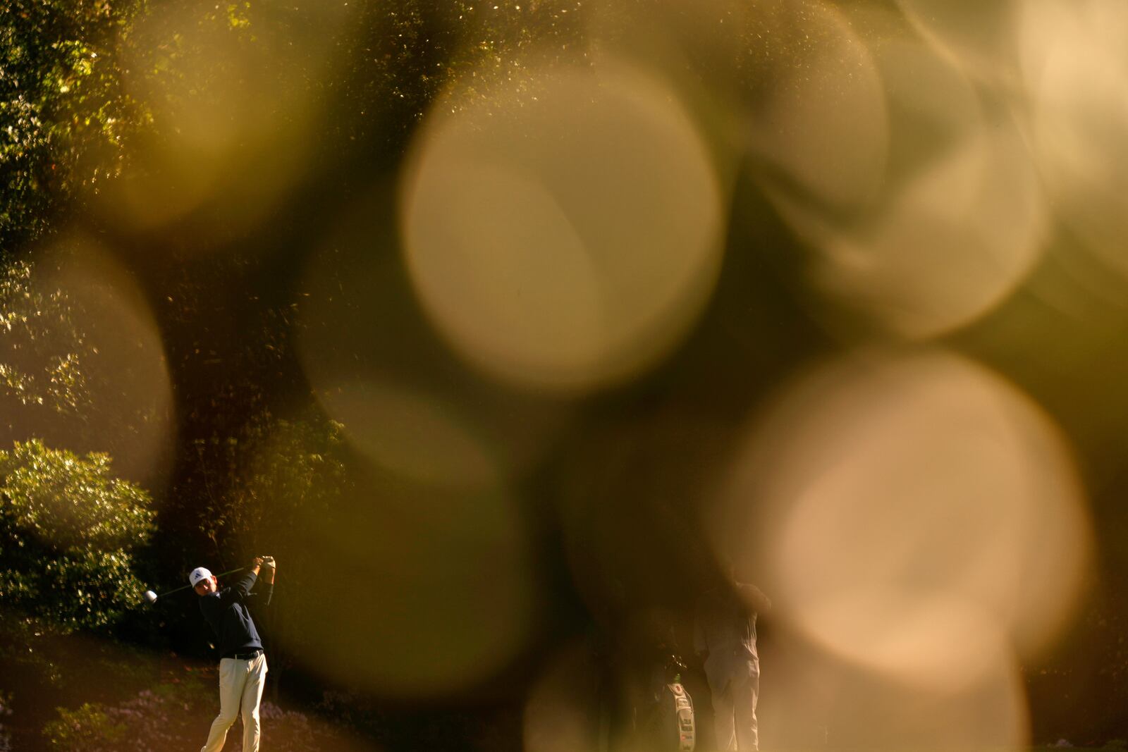Nick Dunlap hits from the 11th tee during a practice round at the Masters golf tournament, Tuesday, April 8, 2025, in Augusta, Ga. (AP Photo/Julia Demaree Nikhinson)