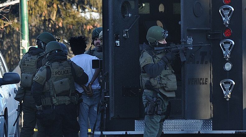 Four teens are charged with aggravated robbery and murder in connection to the shooting death of a Lyft driver. MARSHALL GORBY\STAFF