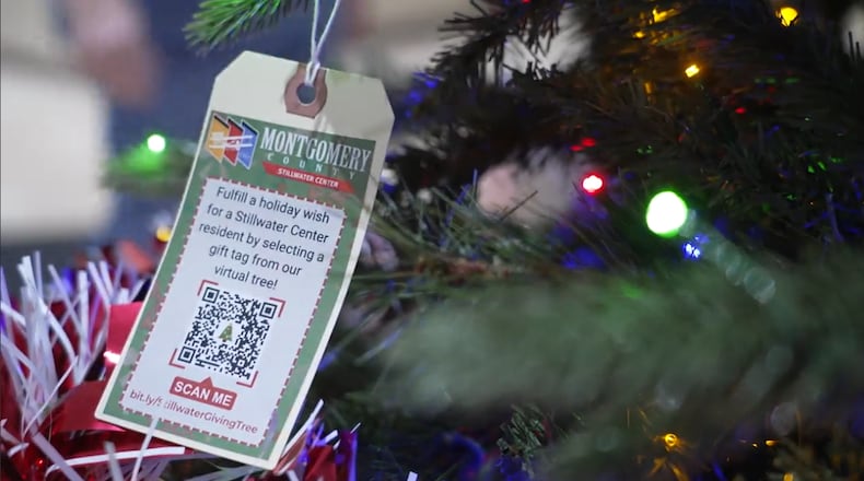 The holiday giving tree in the Montgomery County Administration Building on West Third Street is up. This tree has tag ornaments that contain the info of people living at Stillwater Center, which is a care facility for people with disabilities or long-term illness. COURTESY STILLWATER CENTER