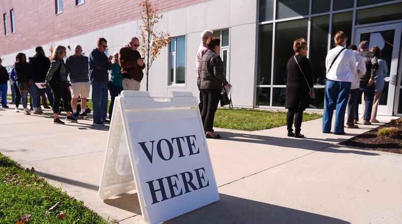 FILE - Voters wait in line to cast there ballot at a polling place at Rowan College in Mt Laurel, N.J., Oct. 27, 2025. (AP Photo/Matt Rourke, File)