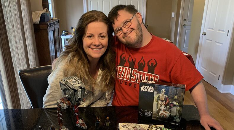 Tracy Vance, an Air Force Research Laboratory Sensors Directorate financial operations specialist, poses for a photo with her brother-in-law Justin Vance. Tracy and her husband brought in Justin from his group home for special needs during the COVID-19 pandemic as his immune system is compromised. (Courtesy photo)