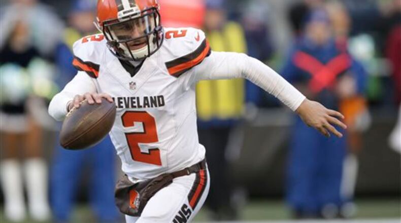 FILE - In this Sunday, Dec. 20, 2015 file photo, Cleveland Browns quarterback Johnny Manziel looks to pass against the Seattle Seahawks in the second half of an NFL football game in Seattle. Johnny Manziel's agent, Drew Rosenhaus, has told the troubled quarterback to seek help or he will no longer represent him, Wednesday, April 13, 2016 (AP Photo/Scott Eklund, File)