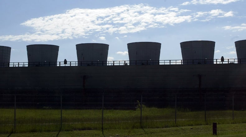 Cooling towers line the sky at the Portsmouth Gaseous Diffusion Plant in this 2006 photograph. PHOTO BY JAN UNDERWOOD
