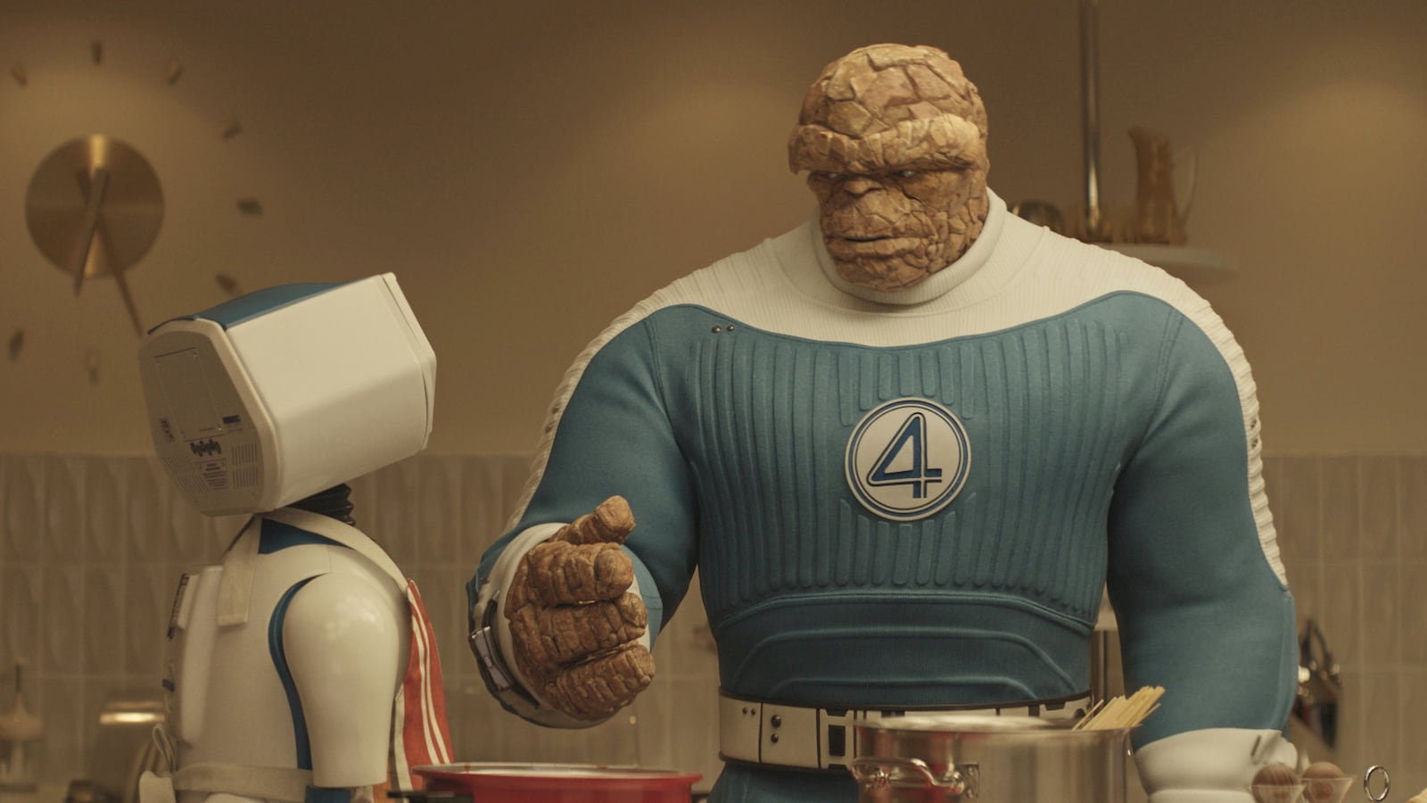 This image released by Disney shows H.E.R.B.I.E, left, and The Thing, portrayed by Ebon Moss-Bachrach, in a scene from "The Fantastic Four: First Steps." (Marvel/Disney via AP)