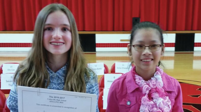 Seventh-grader Zoe Barger (right) won the Cedarville Middle School spelling bee, and sixth-grader Savannah Tison (left) was the runner up. SUBMITTED