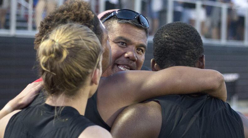 Wayne track and field coach Mike Fernandez celebrates at the regional with the Warriors. JEFF GILBERT / CONTRIBUTED