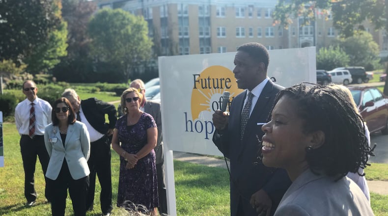 Joey Williams, KeyBank Dayton Market President, speaks during a ceremony about his company’s donation.