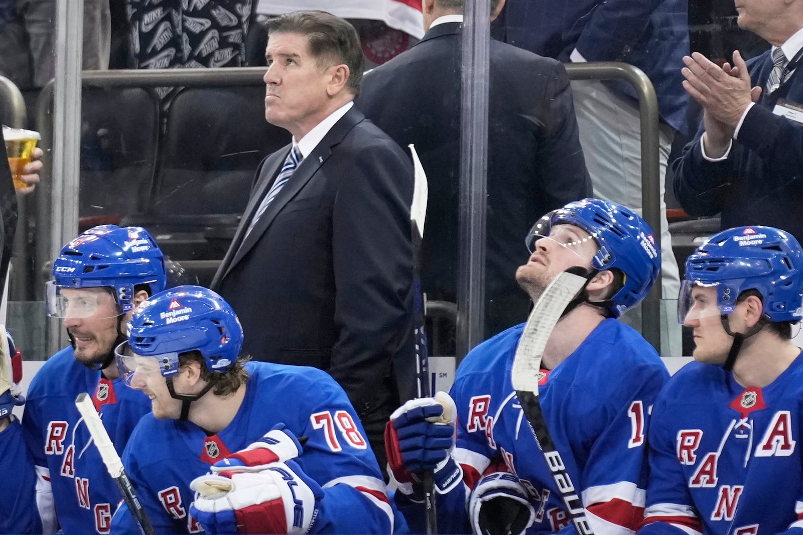 New York Rangers coach Peter Laviolette looks up during the third period of an NHL hockey game against the Tampa Bay Lightning in New York, Thursday, April 17, 2025. (AP Photo/Seth Wenig)