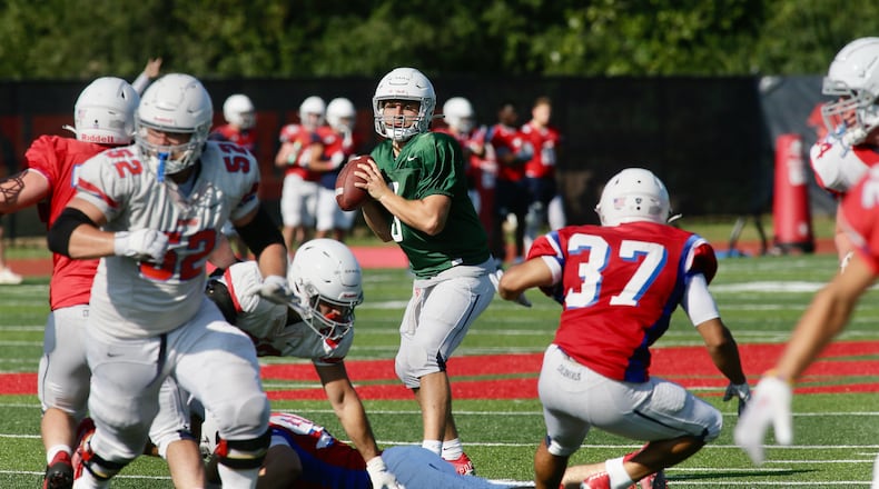 Dayton's Shane Hamm throws a pass in practice on Wednesday, Aug. 17, 2022. David Jablonski/Staff