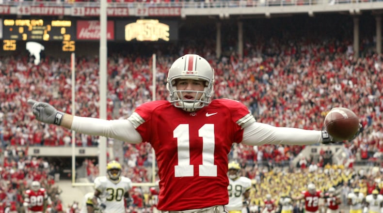 ** FILE ** Ohio State wide receiver Anthony Gonzalez celebrates his 68 yard touchdown reception from quarterback Troy Smith against Michigan at Ohio Stadium in Columbus, Ohio, in this Nov. 20, 2004 file photo. Top-ranked Ohio State takes on No. 2 Michigan on Saturday, Nov. 18, 2006 in Columbus. (AP Photo/Jay LaPrete)