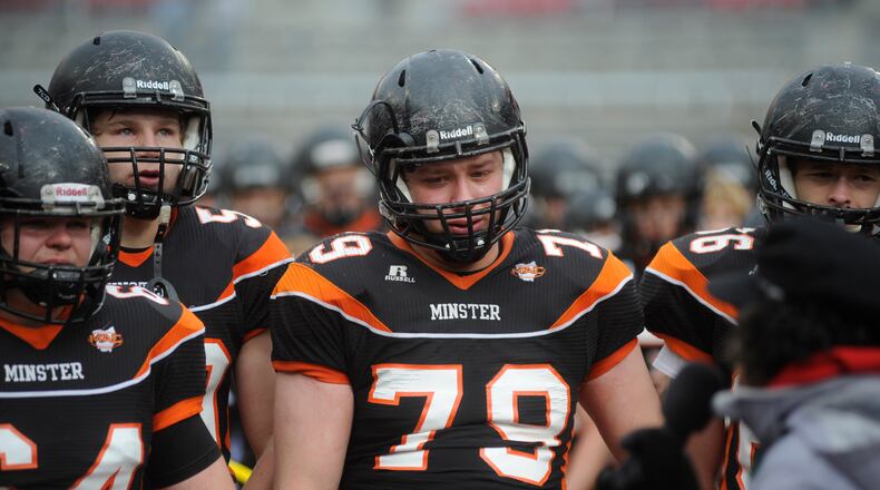 Minster senior lineman Tony Winner (79) and teammates were defeated by Warren JFK 24-6 in the D-VII high school state football championship at Ohio Stadium in Columbus on Saturday. MARC PENDLETON / STAFF