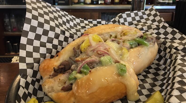 Canal Street Arcade and Deli's Motown Philly is loaded with with Provolone cheese, roast beef, grilled banana peppers, grilled onions and green peppers. CONTRIBUTED/ALEXIS LARSEN