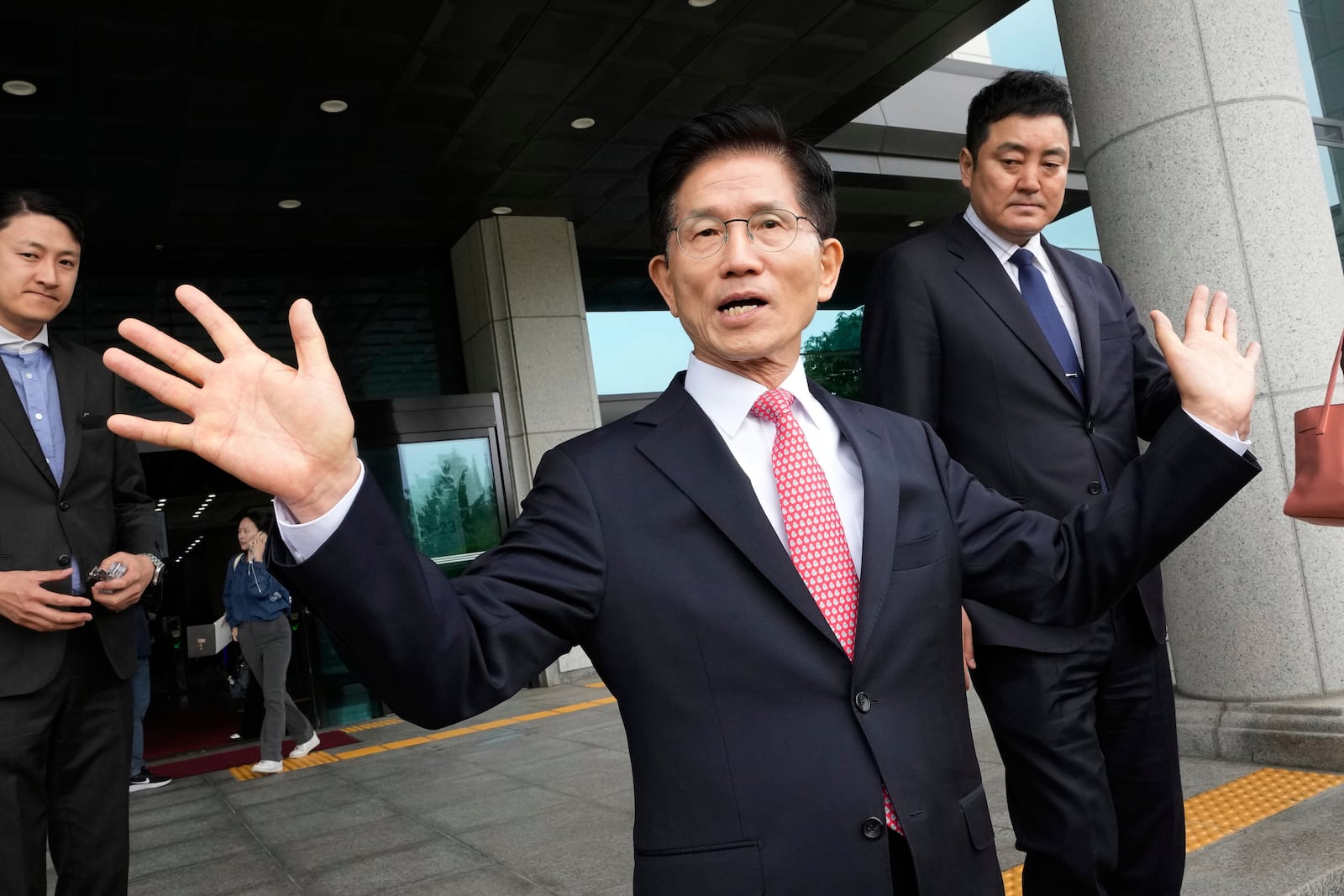 South Korea's People Power Party's presidential election candidate Kim Moon Soo speaks after submitting documents to register as a candidate to run in the June 3 presidential election, at the National Election Commission, Gwacheon, South Korea, Sunday, May 11, 2025. (AP Photo/Ahn Young-joon)