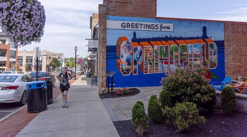 FILE — A “Greetings from Springfield” mural in Springfield, Ohio, on Aug. 27, 2024. In Springfield, threats leave Haitian residents shaken; tension hangs over the city after a week of closings and lockdowns, and the strain of recent months has led some Haitian immigrants to consider moving to bigger cities. (Maddie McGarvey/The New York Times)
