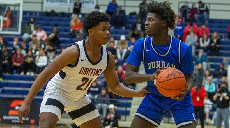 Dunbar senior Darian Leslie looks to pass against Akron Buchtel during Flyin' To The Hoop on Jan, 16, 2022. Jeff Gilbert/CONTRIBUTED