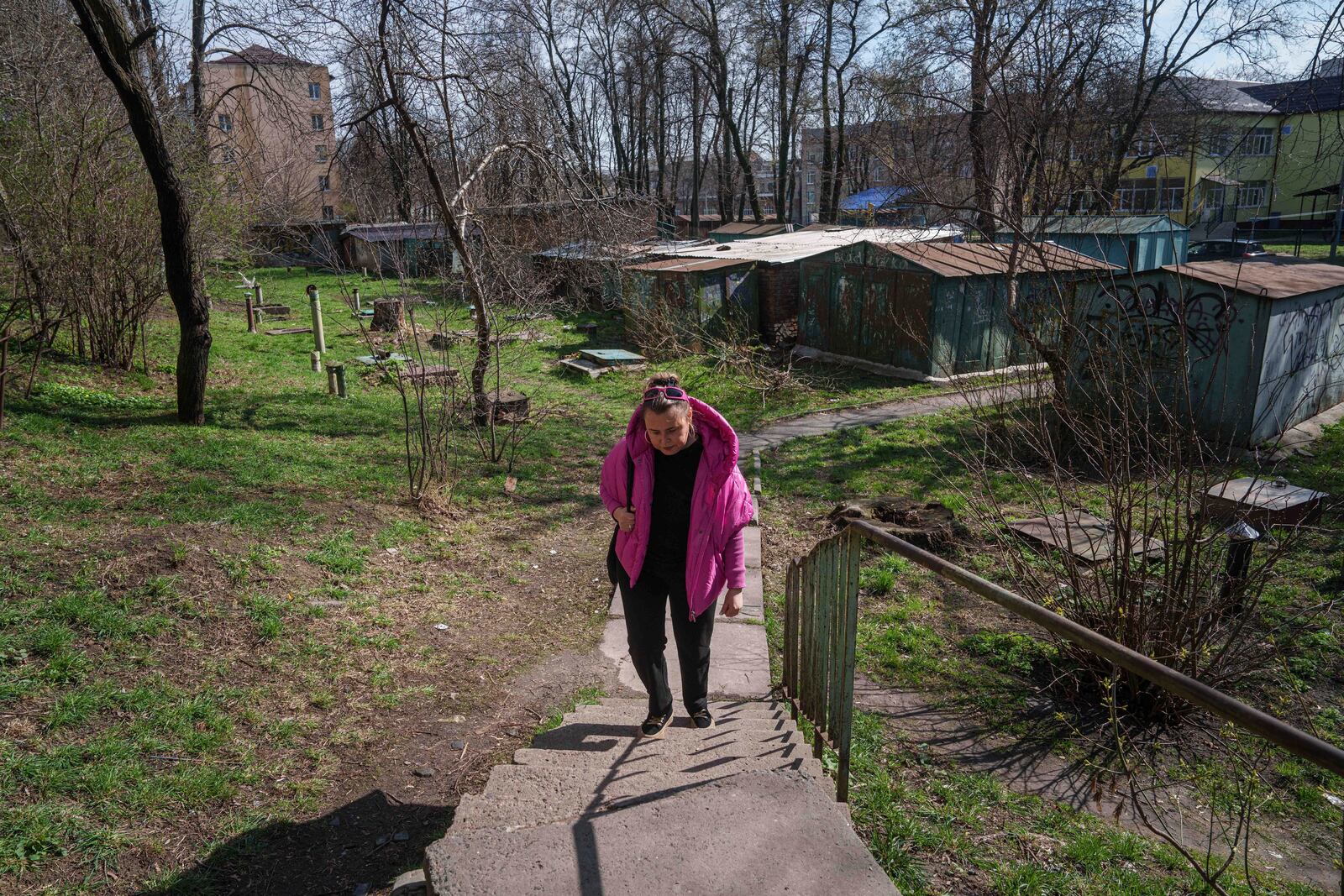 Olena Tsyhipa walks to her home in Kyiv, Ukraine, on April 3, 2025. Her husband, journalist and activist Serhii Tsyhipa, was imprisoned by the Russians in the early days of the war in Ukraine in 2022. (AP Photo/Evgeniy Maloletka)