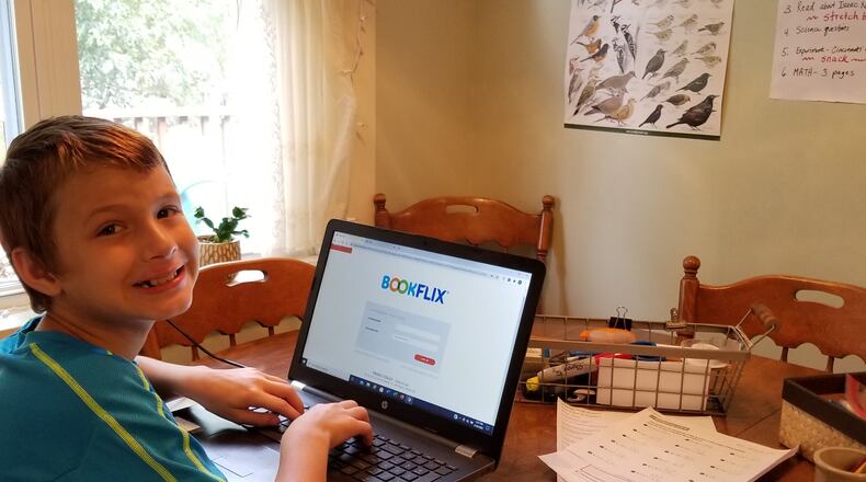 Wyatt Lauricella and his grandmother Cheryl Lauricella worked together to master learning from home. CONTRIBUTED