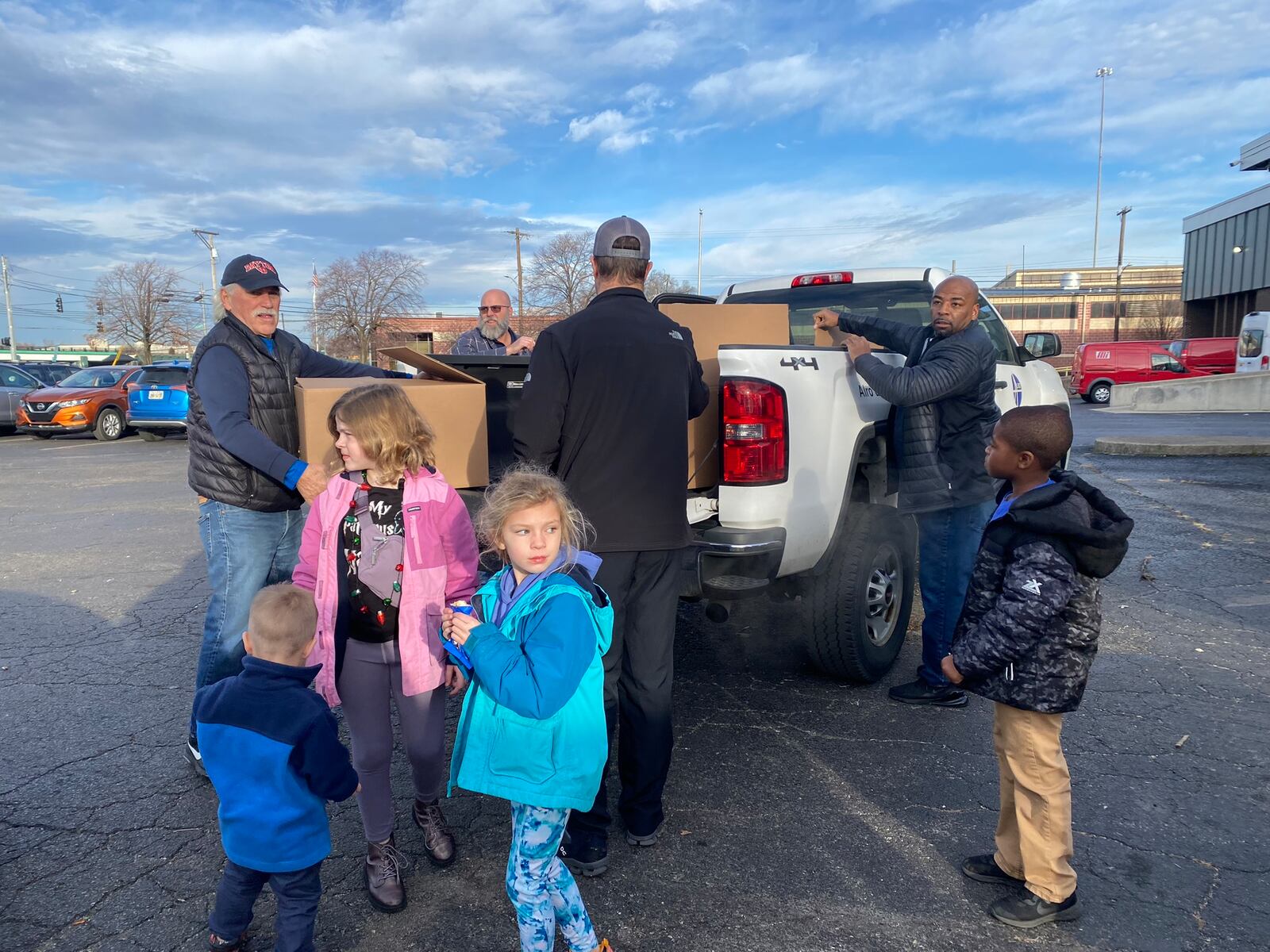 People came to a parking lot on Saturday, Dec. 16, 20223 off North Keowee Street in Dayton to donate stuffed animals, toys and more to Dayton Children's Hospital for the holidays. Eileen McClory / staff