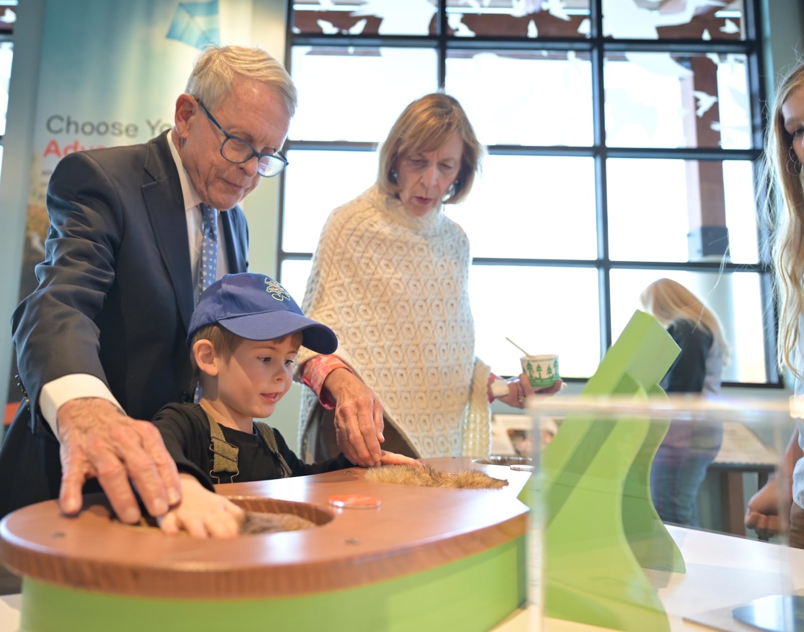 Ohio Gov. Mike DeWine and First Lady Fran DeWine explore the new Buck Creek Park nature center with their grandson Friday, Oct. 17, 2025. CONTRIBUTED