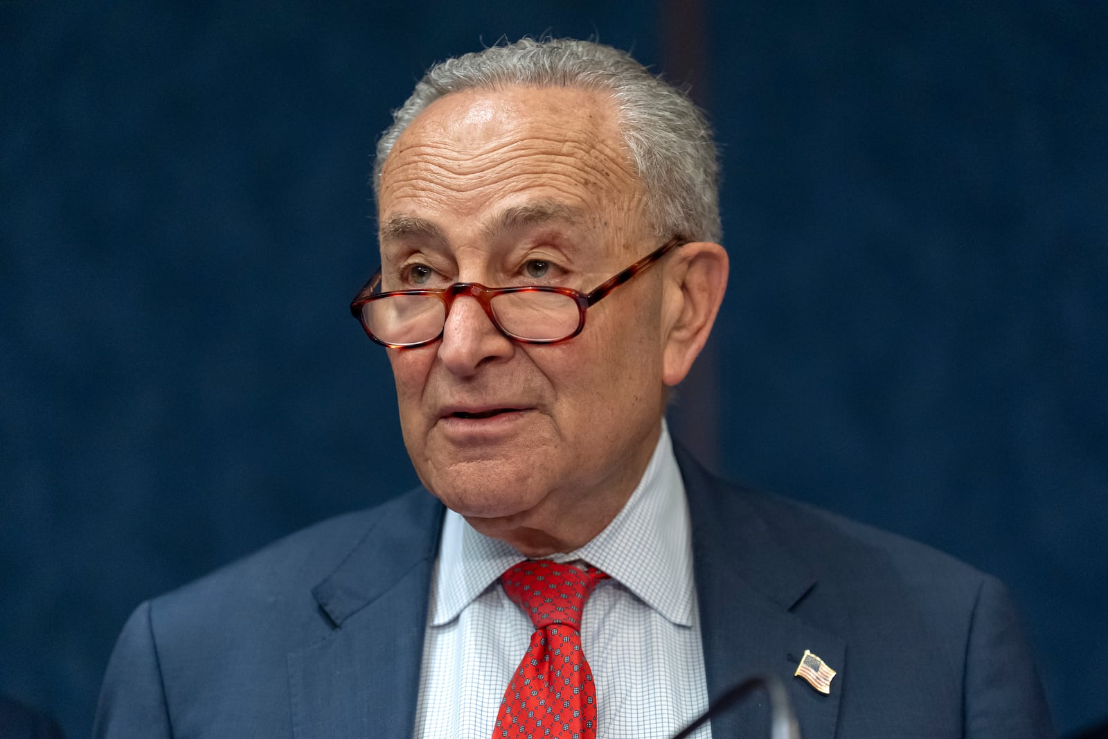 Senate Minority Leader Chuck Schumer, of N.Y., speaks during a news conference to protest cuts in the World Trade Center Health Program on Capitol Hill, Tuesday, May 13, 2025, in Washington. (AP Photo/Mark Schiefelbein)