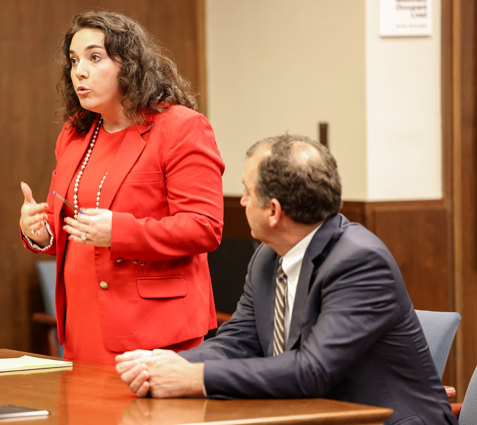 Catherine Jackson, a defense attorney for Montgomery County Clerk of Courts Mike Foley, speaks while attorney Jon Paul Rion listens during a hearing on Tuesday, July 2. Foley's attorneys filed a motion in mid-June to exit a plea agreement for felony and misdemeanor charges related to political contribution solicitation and unauthorized use of computers. BRYANT BILLING / STAFF