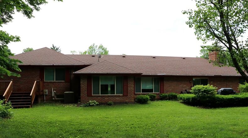 The main bedroom is at the back of the house and has a wall of closets and a private bathroom.