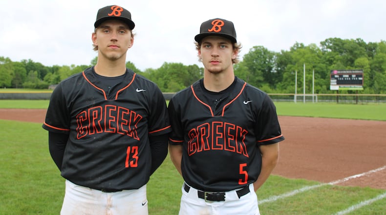 Beavercreek senior pitcher Owen Roether and senior catcher Ethan Papalios stand together after the Beavers’ 10-3 district semifinal win over Centerville on Tuesday night at Mark Stewart Field. JACOB BENGE / CONTRIBUTED PHOTO