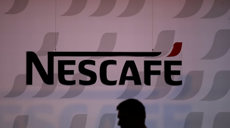 A Nescafe logo stands on display at the Nestle headquarters in Vevey, Switzerland. Bloomberg photo by Stefan Wermuth.