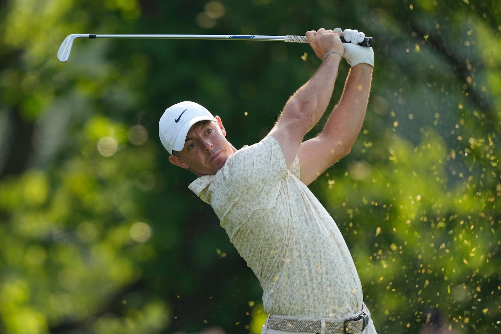 Rory McIlroy, of Northern Ireland, tees off on the 13th hole during the first round of the U.S. Open golf tournament at Oakmont Country Club Thursday, June 12, 2025, in Oakmont, Pa. (AP Photo/Carolyn Kaster)