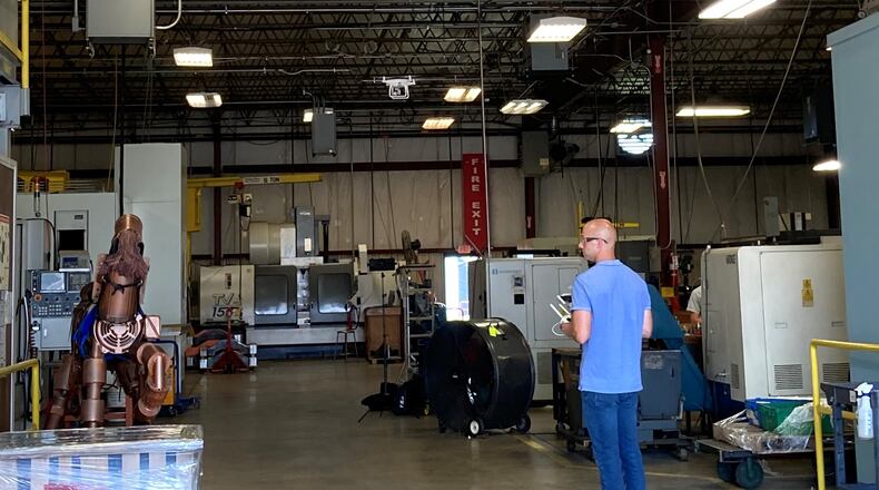 Videographer Joel Nordstrom flying his drone around Detailed Machining in Sidney to get aerial shots of the shop floor. The Dayton Region Manufacturers Association commissioned videos of several member plants to offer students "virtual" tours on Manufacturing Day, which is Oct. 2. Contributed