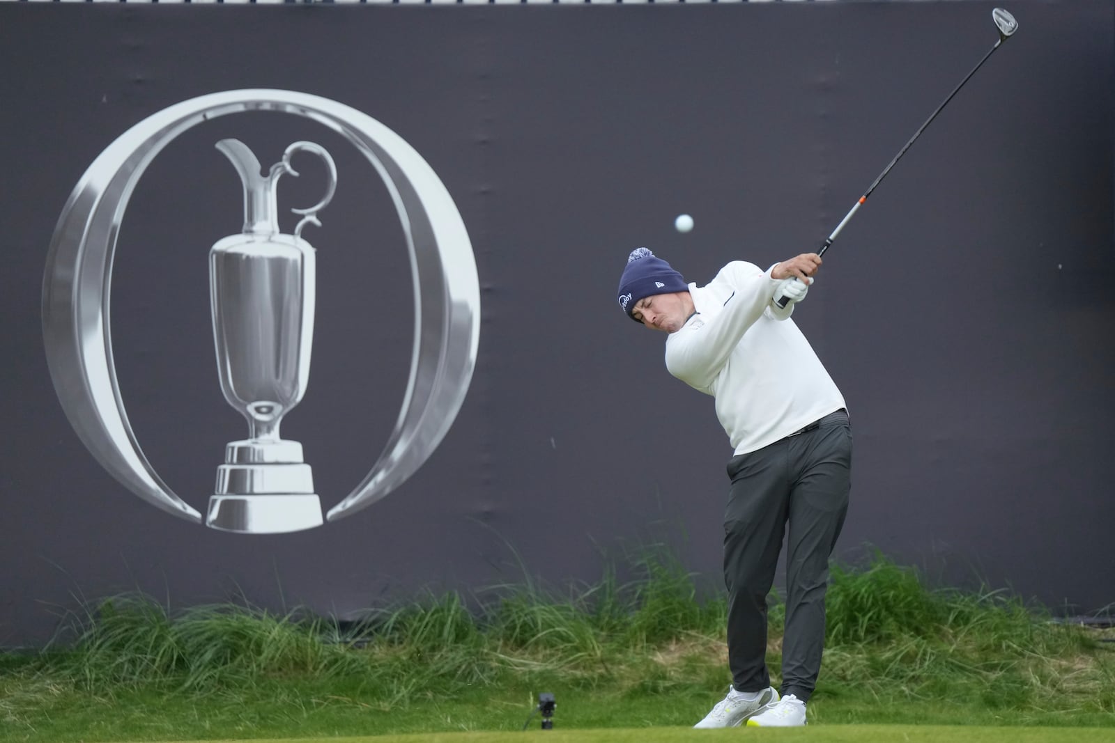 Matt Fitzpatrick of England plays off the 1st hole during the first round of the British Open golf championship at the Royal Portrush Golf Club, Northern Ireland, Thursday, July 17, 2025. (AP Photo/Jon Super)